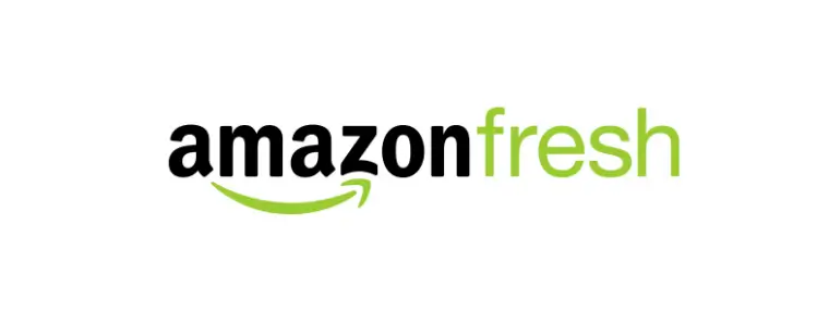 Amazon Fresh logo with "amazon" in black letters and "fresh" in green letters. A green curved arrow underlines the "amazon" part. The background is white.