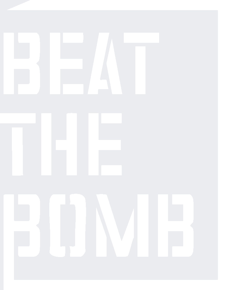 Bold white text on a light gray background reads "BEAT THE BOMB" in a large, blocky font. The text is arranged in three lines and takes up most of the image.