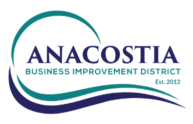 Logo for Anacostia Business Improvement District, established 2012, featuring teal and navy curved lines forming a partial circle and wave beneath the organization name.