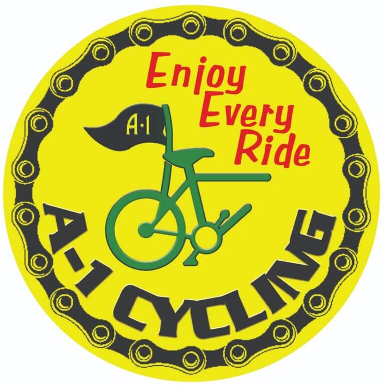 A yellow circular logo with a bicycle at the center, a flag reading "A-1," chain links border, and the texts "Enjoy Every Ride" above and "A-1 CYCLING" below in black and red letters.