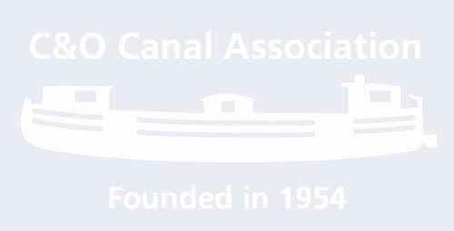 White silhouette of a canal boat with the text "C&O Canal Association" above and "Founded in 1954" below, all on a light gray background.