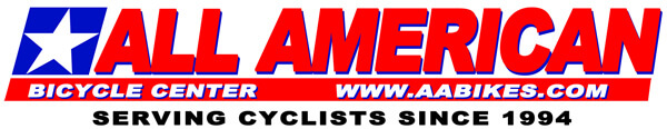 Logo for All American Bicycle Center with a blue star, red and blue text, website URL "www.aabikes.com," and the slogan "Serving Cyclists Since 1994.