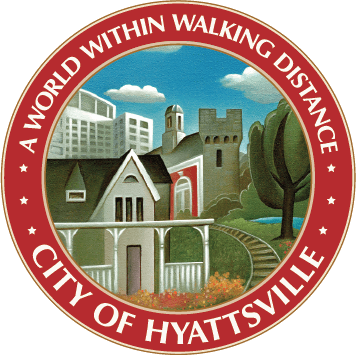 A circular seal featuring buildings, trees, and a railroad track. The red border reads "A World Within Walking Distance" at the top and "City of Hyattsville" at the bottom.