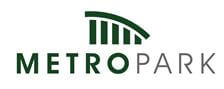 Logo for Metro Park featuring green capitalized text "METRO" and gray "PARK" below a green arch with vertical bars, resembling a stylized bridge or park structure.
