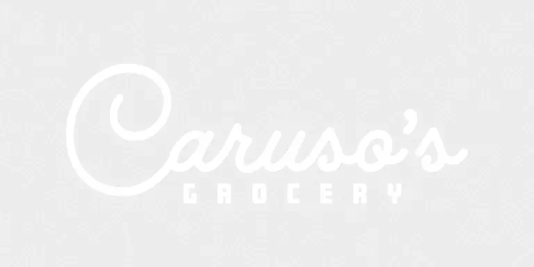 White text on a light gray background reads “Caruso’s Grocery” in a mix of cursive and block letters.