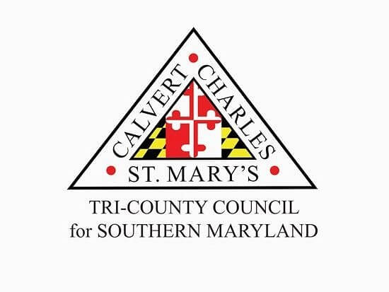 A triangular logo featuring the Maryland flag symbols and the words "Calvert," "Charles," and "St. Mary's." Below it reads "Tri-County Council for Southern Maryland" in black text on a white background.