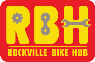 Logo for Rockville Bike Hub with large yellow letters "RBH" on a red background. The "R" has a gear, the "B" has a bike chain link, and the "H" has a wrench. "ROCKVILLE BIKE HUB" is written below in yellow text.